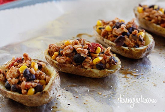 Skinny potato skins loaded Santa Fe style with mildly spiced turkey, black beans, corn and tomatoes topped with cheese - you won't be able to stop at just one!
