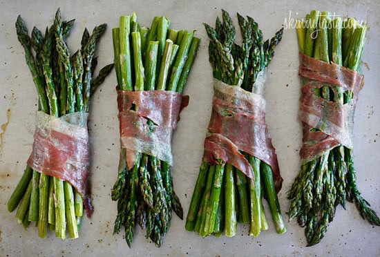 Nothing says Spring like the sweet taste of asparagus! Roasted prosciutto wrapped asparagus bundles that is, for a simple yet elegant side dish, perfect for Easter.