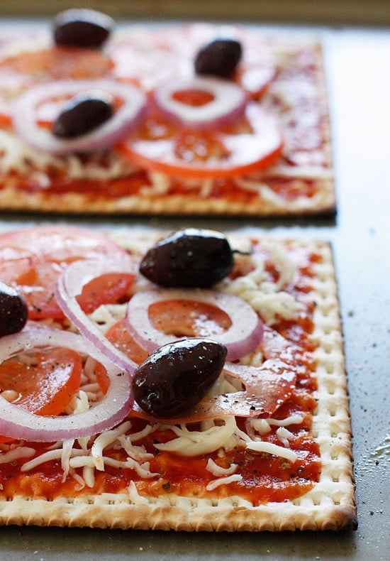 A matzo cracker makes a great base for a pizza that kids and adults will love for Passover! Top it with your favorite vegetables and cheese and you have yourself a quick meal.