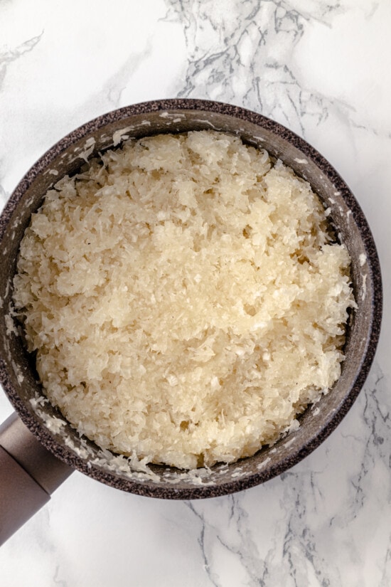 Made with sweetened coconut flakes, egg whites, and just a few other ingredients, Coconut Macaroons are moist, chewy, and perfectly flavored. Shredded coconut mixed with egg whites in a pan