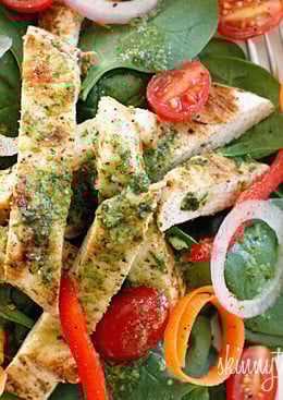 Chicken marinaded with lemon, garlic and oregano, then grilled to perfection and served over a colorful spinach salad. Topped with a white balsamic vinaigrette, does it get better than that?