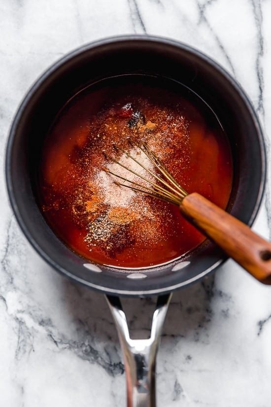 Homemade sweet and spicy Kansas City style BBQ sauce made with tomato sauce, honey, molasses, vinegar and spices.