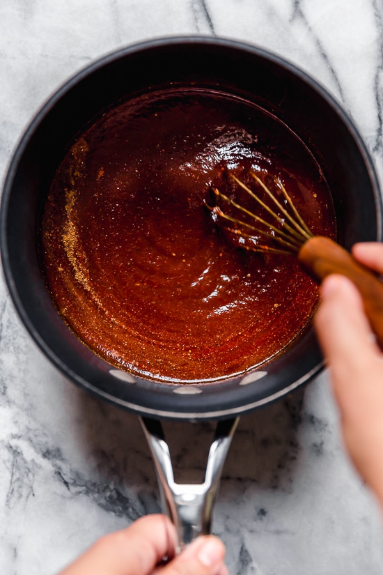 Homemade sweet and spicy Kansas City BBQ sauce made with tomato sauce, honey, molasses, vinegar and spices.