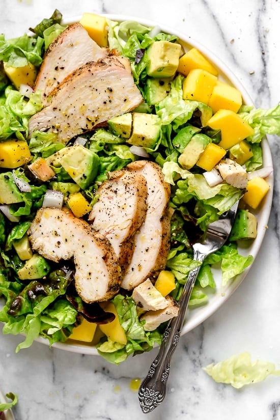 Grilled Chicken pairs beautifully with avocados and mangoes in this delicious salad, perfect for those warmer nights you don't want to heat up the kitchen.