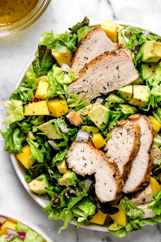 Grilled Chicken pairs beautifully with avocados and mangoes in this delicious salad, perfect for those warmer nights you don't want to heat up the kitchen.