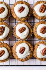 These super moist hummingbird cupcakes are light, full of pineapple, chopped bananas, pecans, cinnamon and spices topped off with a sweet cream cheese frosting.