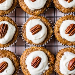 These super moist hummingbird cupcakes are light, full of pineapple, chopped bananas, pecans, cinnamon and spices topped off with a sweet cream cheese frosting.