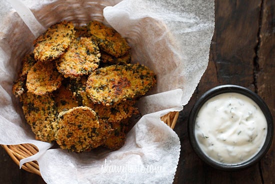 Cornmeal panko herb crusted dill pickles baked in the oven until golden and crisp with a light buttermilk ranch dip. Have you ever had fried pickles?