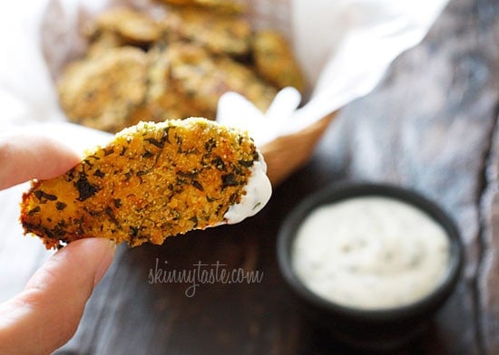 Cornmeal panko herb crusted dill pickles baked in the oven until golden and crisp with a light buttermilk ranch dip. Have you ever had fried pickles?
