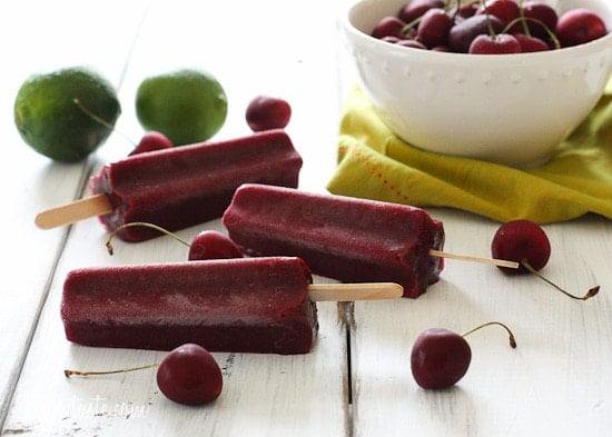 Cherry Lime Ice Pops – Sweet summer cherries with a touch of lime make these easy, sweet popsicles a perfect treat on a hot summer day. Only 4 ingredients!
