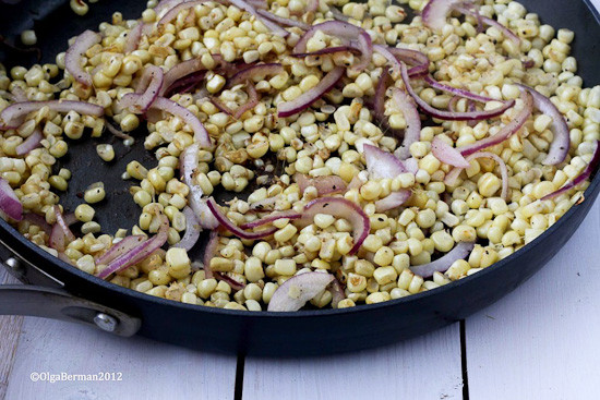 This warm pasta salad is big on summer vegetables, corn and zucchini, with a small kick of red pepper. A great sub to potato salad and a perfect meatless entree or side dish for your next picnic or family potluck.