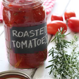 Summer plum tomatoes roasted in the oven with garlic and herbs make an easy, delicious homemade tomato sauce that will fill the room with an intoxicating aroma.