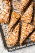 Overhead view of apple scones drizzled with spiced glaze