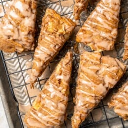 Overhead view of apple scones drizzled with spiced glaze