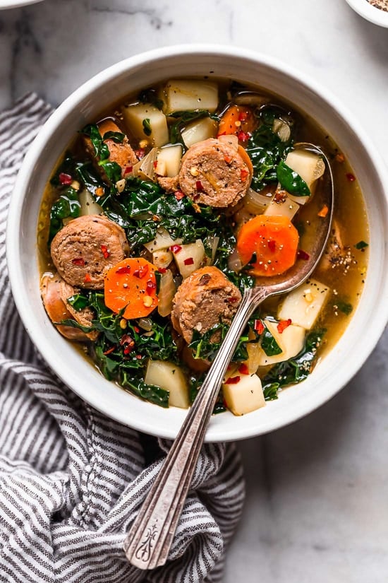Kale and Potato Soup with Turkey Sausage is an easy, hearty soup made with kale, potatoes, carrots and turkey or chicken sausage.