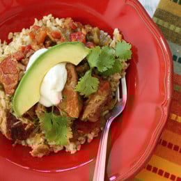 Slow Cooker Pork and Green Chili Stew – Chunks of lean pork, slow cooked in the crock pot with tomatoes, green chiles and jalapeño for a delicious weeknight stew meal with a little bit of heat!