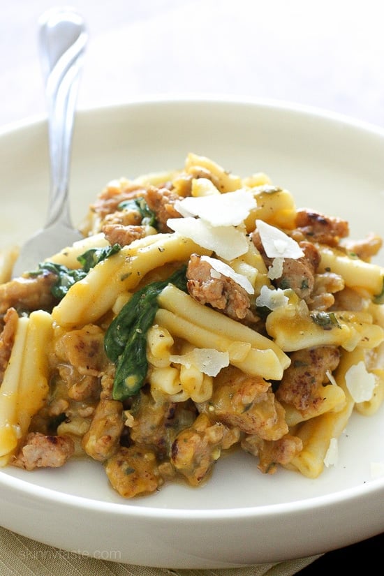 Pasta with Butternut Squash Sauce, Spicy Sausage and Baby Spinach Pasta in a decadent creamy, homemade, butternut squash pasta sauce, with no cream! The spicy chicken sausage and sage is the perfect compliment, this pasta dish is filling and comforting on a chilly night.