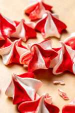 Peppermint meringues on parchment paper