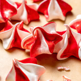 Peppermint meringues on parchment paper