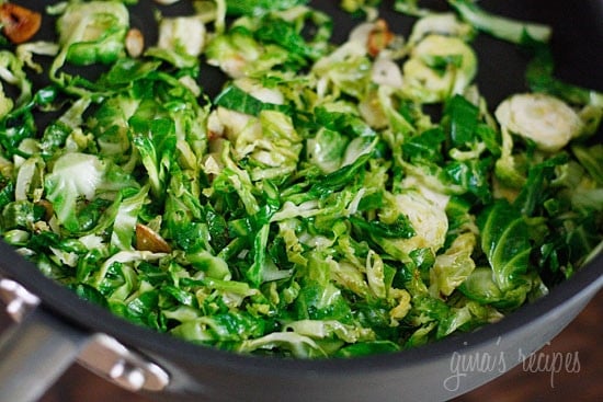 Penne pasta tossed with sauteed brussels sprouts and a quick meat ragu using lean ground turkey and just enough hot Italian pork sausage to enhance the flavor of the sauce. A hearty pasta dish for a crisp Autumn day.