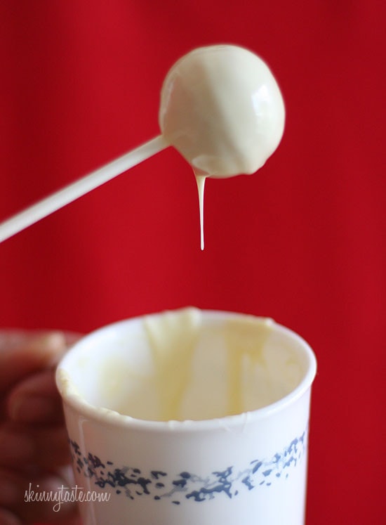 These Skinny Cake pops are made lighter by using a box cake mix, egg whites and fat free Greek yogurt – no oil, no butter required!