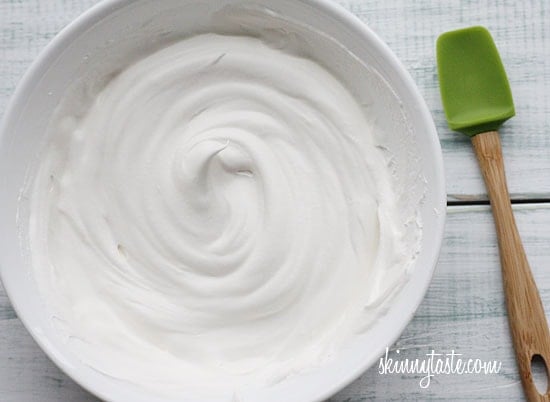 This skinny eggnog cake is so delicious. Simply combine a yellow box cake mix with nutmeg, Chobani, water, egg whites and you'll have a perfect holiday dessert!