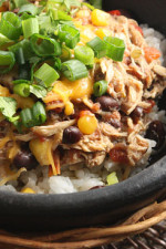 Slow cooker shredded chicken with corn, tomatoes and black beans. Prep this the night before and turn your crock pot on in the morning for an easy weeknight meal.