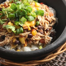 Slow cooker shredded chicken with corn, tomatoes and black beans. Prep this the night before and turn your crock pot on in the morning for an easy weeknight meal.