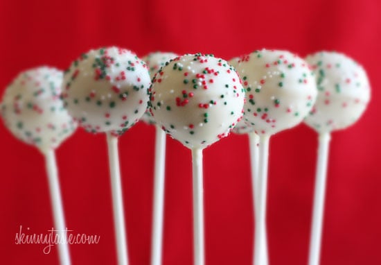 These Skinny Cake pops are made lighter by using a box cake mix, egg whites and fat free Greek yogurt – no oil, no butter required!