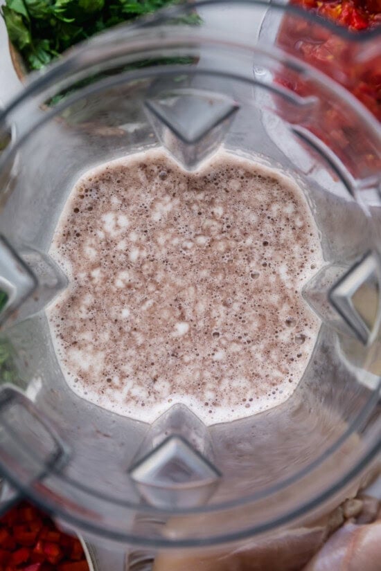 Blend a can of beans with some broth.