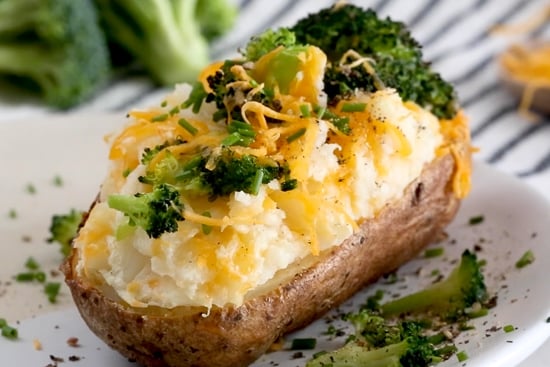 Twice Baked Potatoes with Broccoli and Cheese close up.