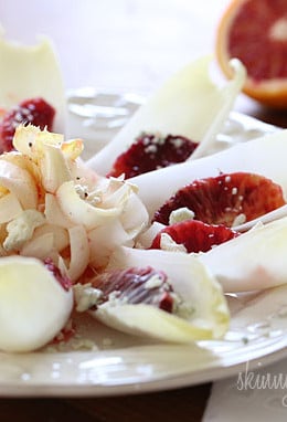 A simple salad made with endive lettuce, blood oranges, Gorgonzola with a blood orange vinaigrette.