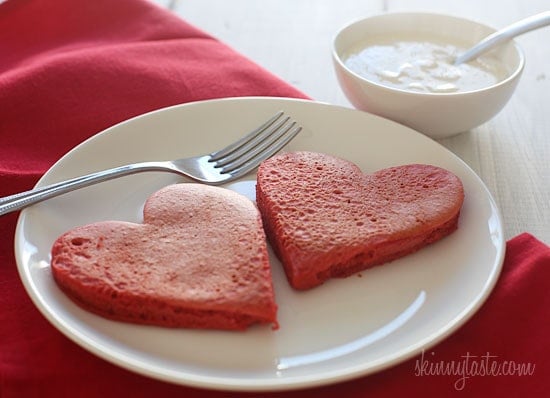 These lightened-up red velvet pancakes are made with a blend of white whole wheat flour and all purpose, then topped with a light cream cheese topping. I adore red velvet, so I can't think of a more fitting time to make red velvet pancakes, then for Valentine's Day!