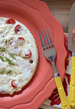 A quick and easy breakfast made with tomatoes, egg whites, mozzarella, and parmesan cheese. Lots of flavor, low in carbs and takes just minutes to make.