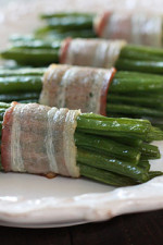 Pretty little bundles of bacon wrapped French "green beans" known as Haricot verts which are longer and thinner than the typical American green beans. Of course, American green beans will work just fine here too.