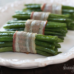 Pretty little bundles of bacon wrapped French "green beans" known as Haricot verts which are longer and thinner than the typical American green beans. Of course, American green beans will work just fine here too.