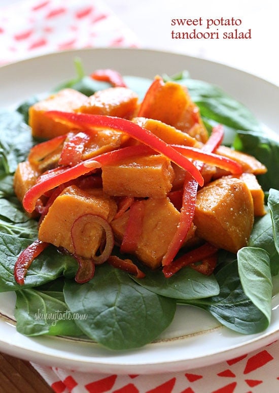 Kumara (Sweet Potato) Tandoori Salad Kumara tandoori salad made of roasted sweet potatoes, seasoned with curry and spices, then tossed with bell peppers, baby spinach and a flavorful vinaigrette.