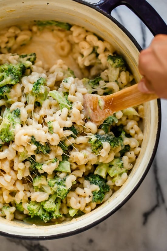 This homemade, lightened up baked mac and cheese recipe adds broccoli to the mix, a great way to sneak veggies in a kid's favorite dish!