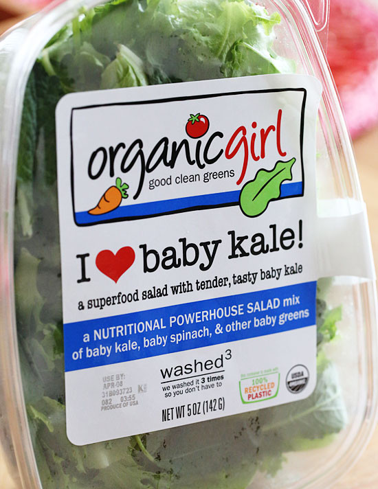 Strawberry salad made with mixed greens, kale and spinach, sliced almonds, crumbled gorgonzola cheese and topped with poppy seed dressing – perfect for summer!