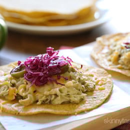 Chicken tenders are slow cooked in the crock pot with salsa verde, then served on a crispy corn tostada and topped with melted cheese, jalapeño and a simple cabbage slaw made with red cabbage, lime juice, cilantro and salt. I could eat these everyday!!