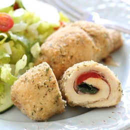 These baked stuffed chicken breasts are really simple to make, stuffed with melted cheese, roasted red peppers, prosciutto and baby spinach.