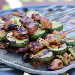 Grilled Chicken and Zucchini Yakitori – Japanese inspired grilled chicken and zucchini skewers marinated with yakitori sauce and threaded onto bamboo sticks with green onions.