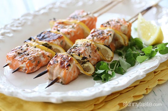 These healthy salmon and lemon kebabs are delicious and easy to make, loaded with omega 3s in every bite! Seasoned with fresh herbs, lemon, and spices and grilled to perfection.