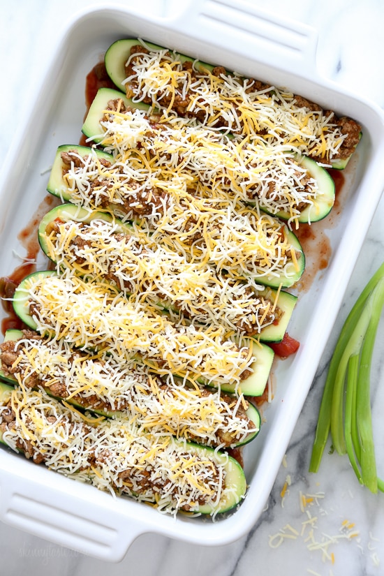 For a low-carb, summer spin on taco night, you'll love these Taco Stuffed Zucchini Boats filled with seasoned ground turkey and topped with a Mexican cheese blend.