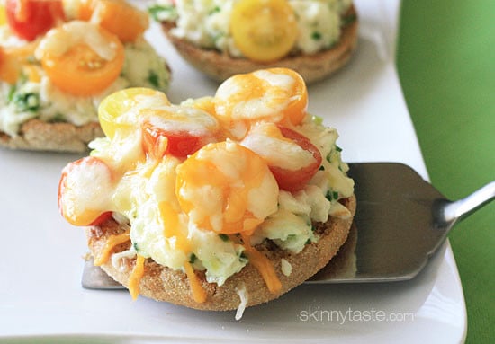 Easy open faced egg and tomato breakfast melts – Sandwiches made on whole wheat English muffin, egg whites and scallions, topped with tomatoes and melted cheese.
