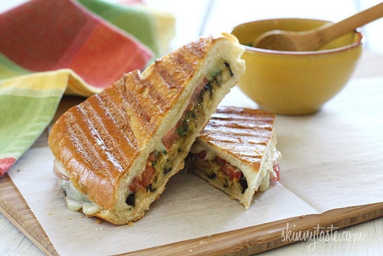 A perfect summer lunch panini made with eggplant, tomatoes, mozzarella and skinny pesto on crispy French bread. Make this for one, or for the whole family.