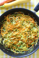 Zucchini, yellow squash and carrots cut into spaghetti like strands and sauteed with garlic and oil. I make this side dish ALL summer long – not just because it's low-carb, gluten-free, clean and paleo friendly, but because it's delicious, good for you and also happens to be my husband's favorite way to enjoy zucchini!