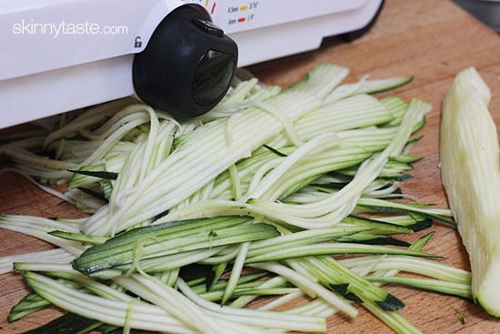 Zucchini, yellow squash and carrots cut into spaghetti like strands and sauteed with garlic and oil. I make this side dish ALL summer long – not just because it's low-carb, gluten-free, clean and paleo friendly, but because it's delicious, good for you and also happens to be my husband's favorite way to enjoy zucchini!