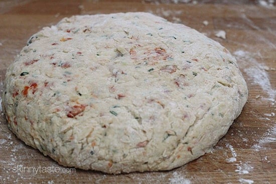 Light and biscuit-like savory scones made with a blend of whole wheat and white flour, shredded zucchini, sun dried tomato, Asiago cheese and fresh rosemary.
