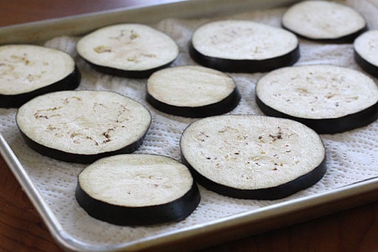 A perfect summer lunch panini made with eggplant, tomatoes, mozzarella and skinny pesto on crispy French bread. Make this for one, or for the whole family.